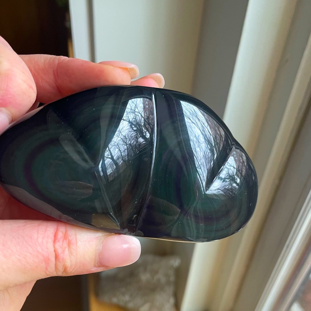 Hand carved rainbow obsidian double hearts from Mexico